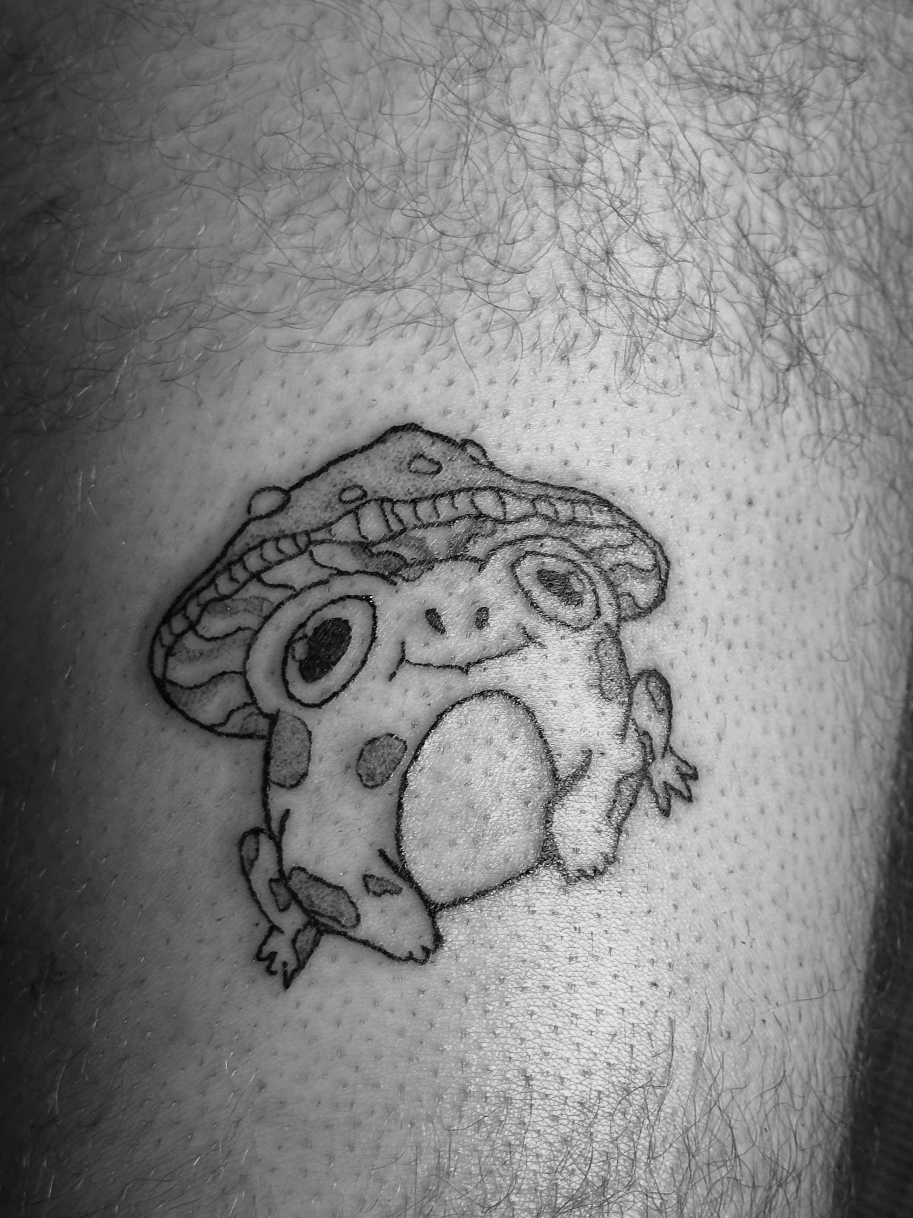 Mushroom frog tattoo by Ian Jensen
