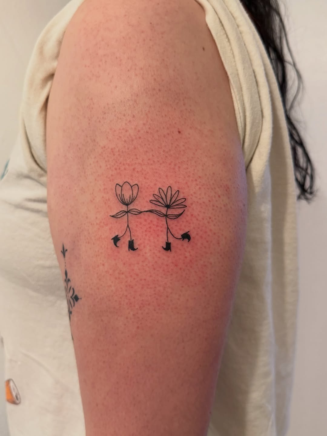 Dancing flowers tattoo by Tati Johnston